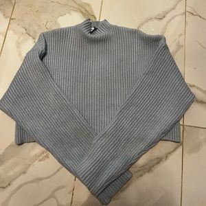 Light blue cropped turtleneck sweater